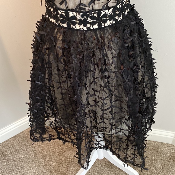 Black and sheer cocktail dress with tiny ribbons - Picture 3 of 4